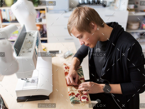 demo-attachment-556-fashion-designer-with-making-dress-at-studio-P75Z6LP